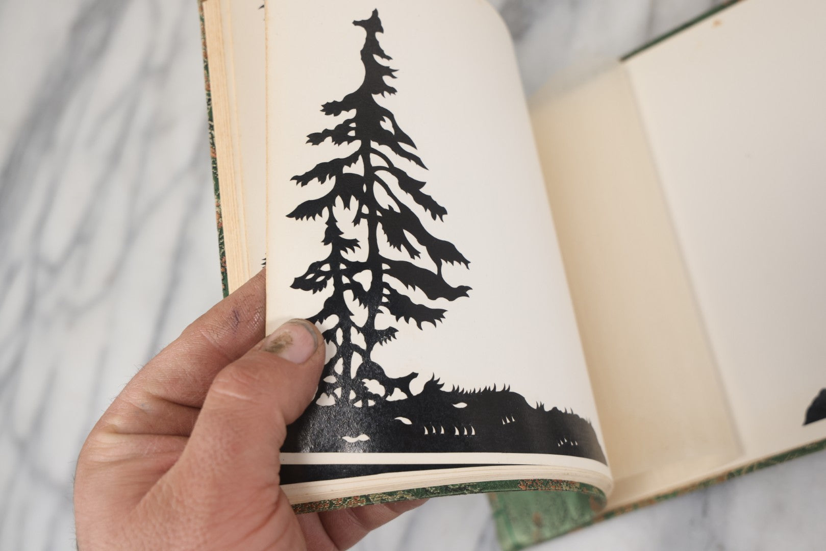 Lot 120 - Vintage East Asian Cloth Covered Art Book With Black Paper Cut Silhouettes