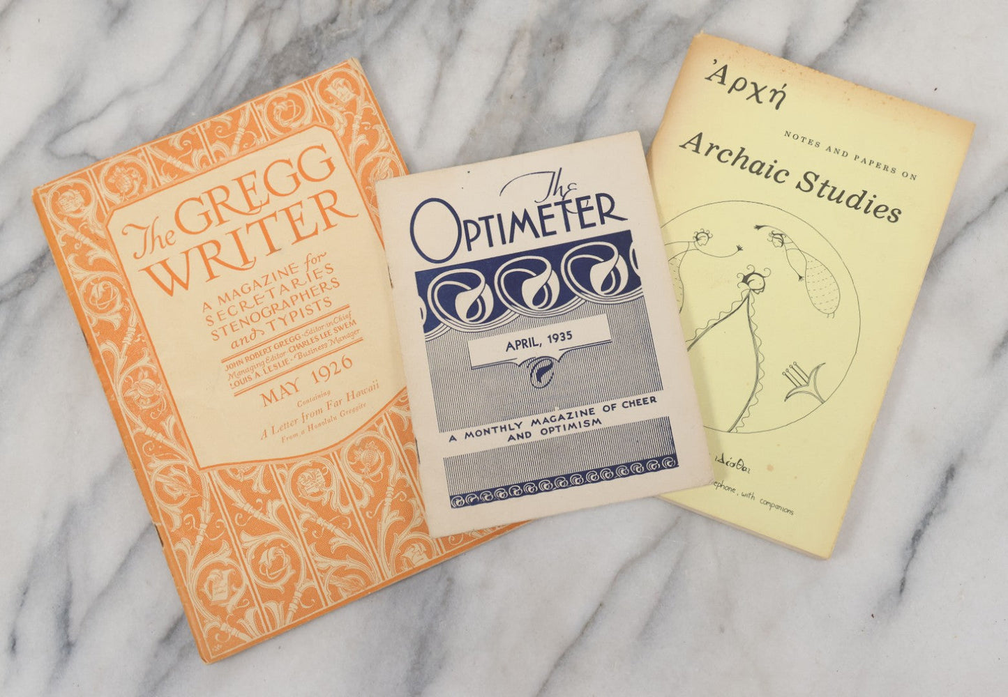 Lot 121 - Trio Of Miscellaneous Ephemera Booklets Including "The Optimeter" April 1935 Magazine On Optimism, Published By Kilkenny & Calkin, Funeral Directors Of Concord, N.H., Archaic Studies Booklet, And The Gregg Writer Magazine For Typists