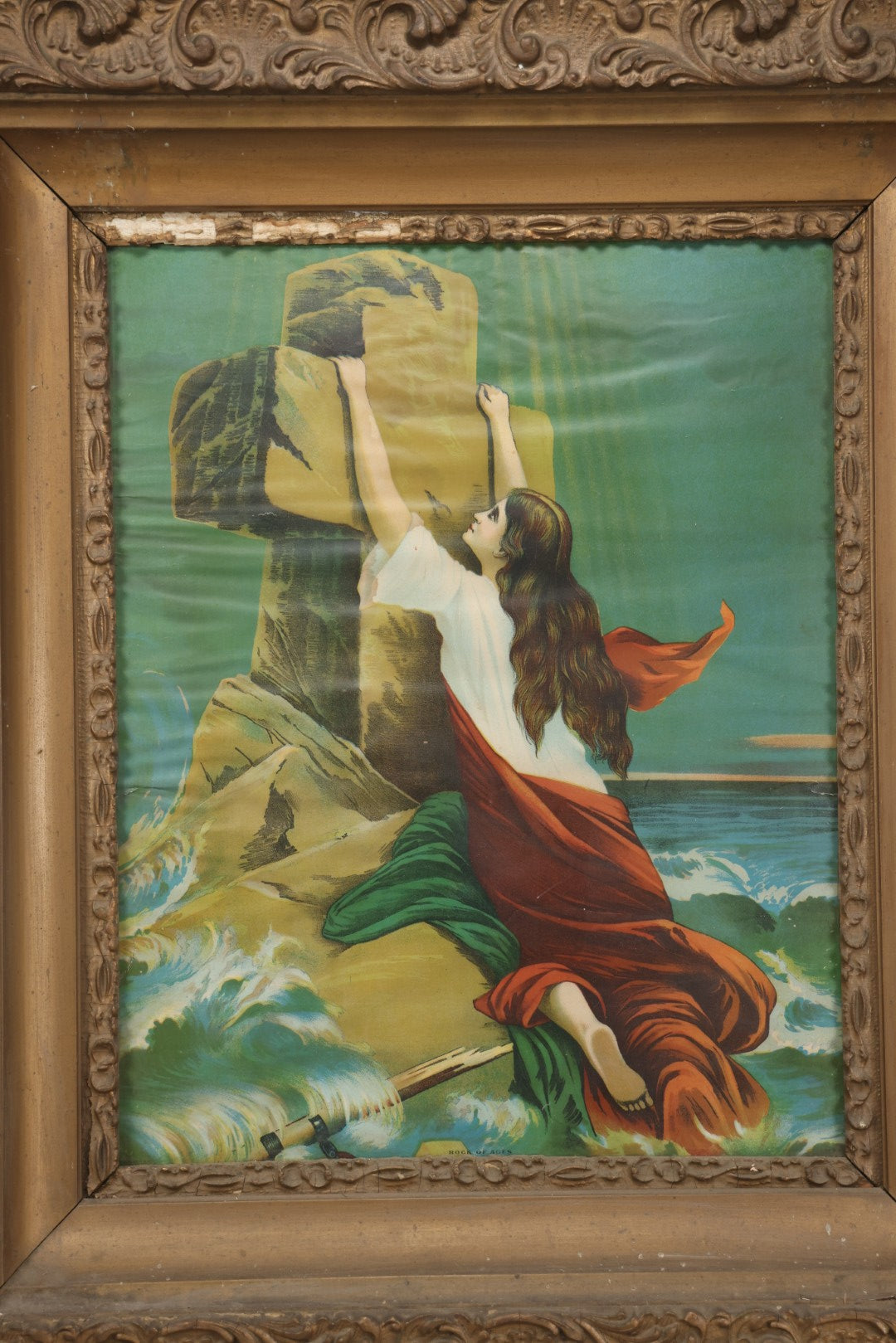Lot 004 - Antique Chromolithograph Of The "Rock Of Ages" Woman At Sea In Distress Clinging To Cross, In Large Ornate Gilded Frame, 26-1/4" x 30-1/4"