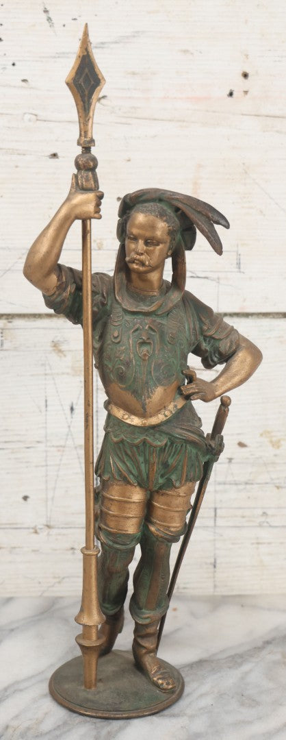 Lot 012 - Antique Cast Metal Statue Of A Soldier In Armor Holding A Spear, Note Green Man On Chest, Patinated, Gilded Finish, 16-1/8" Overall Height