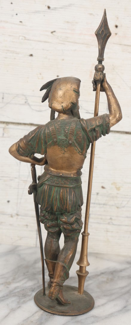 Lot 012 - Antique Cast Metal Statue Of A Soldier In Armor Holding A Spear, Note Green Man On Chest, Patinated, Gilded Finish, 16-1/8" Overall Height