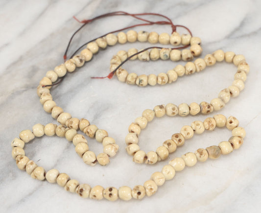 Lot 020 - Vintage Carved Howlite Skull Prayer Beads On Red Cord, Overall Length Approximately 34"