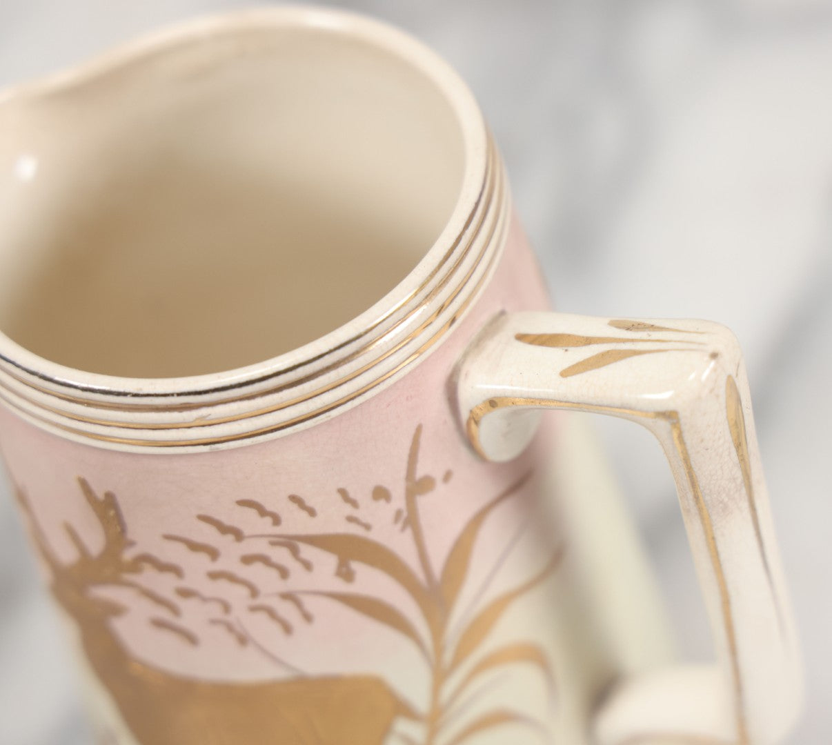 Lot 032 - Antique Ceramic Pitcher With Butterfly, Elk Motif, Pink And Gold Coloring, Minor Chipping
