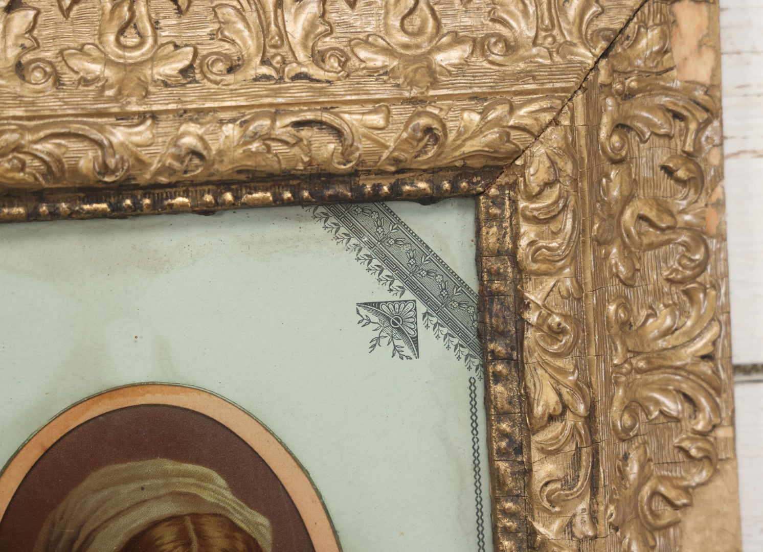 Lot 038 - Antique Chromolithograph Portrait Print Of A Victorian Woman In Headscarf, In Ornate Wooden Gilded Wooden Frame With Decorative Nature Motif Mat, 13-1/4" x 15-1/4"