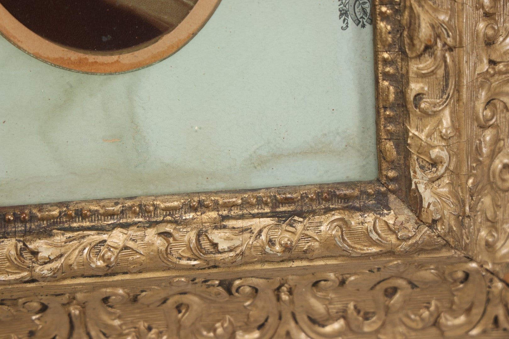 Lot 038 - Antique Chromolithograph Portrait Print Of A Victorian Woman In Headscarf, In Ornate Wooden Gilded Wooden Frame With Decorative Nature Motif Mat, 13-1/4" x 15-1/4"