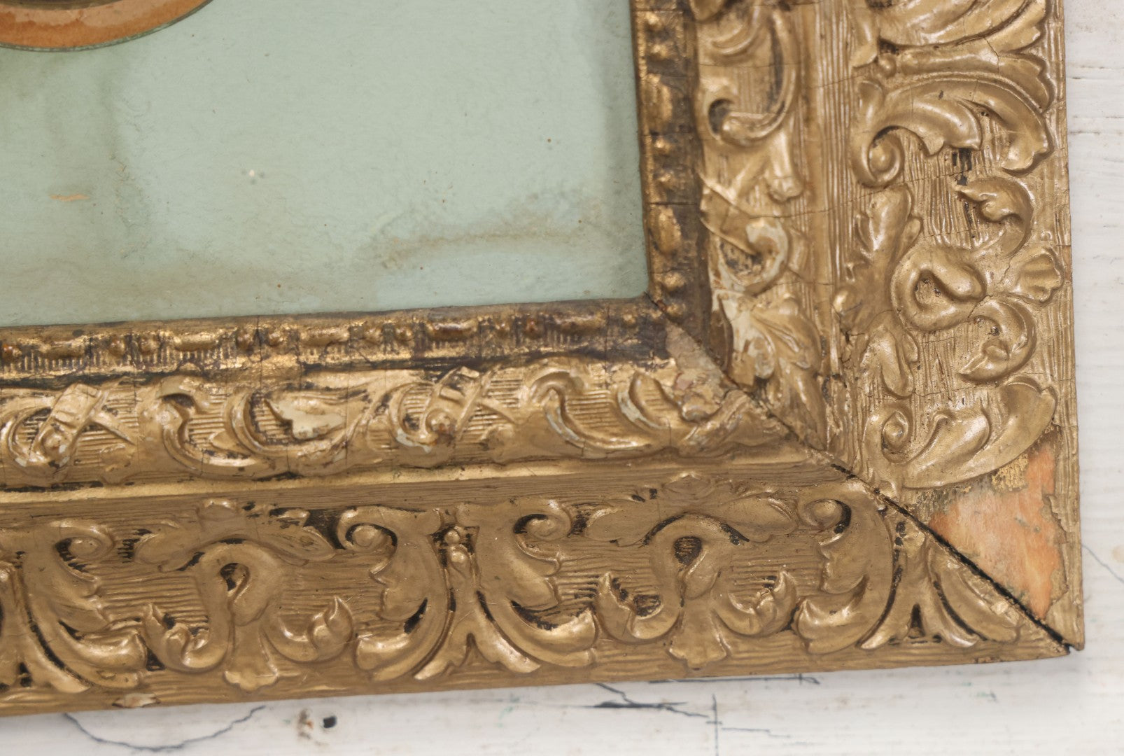 Lot 038 - Antique Chromolithograph Portrait Print Of A Victorian Woman In Headscarf, In Ornate Wooden Gilded Wooden Frame With Decorative Nature Motif Mat, 13-1/4" x 15-1/4"