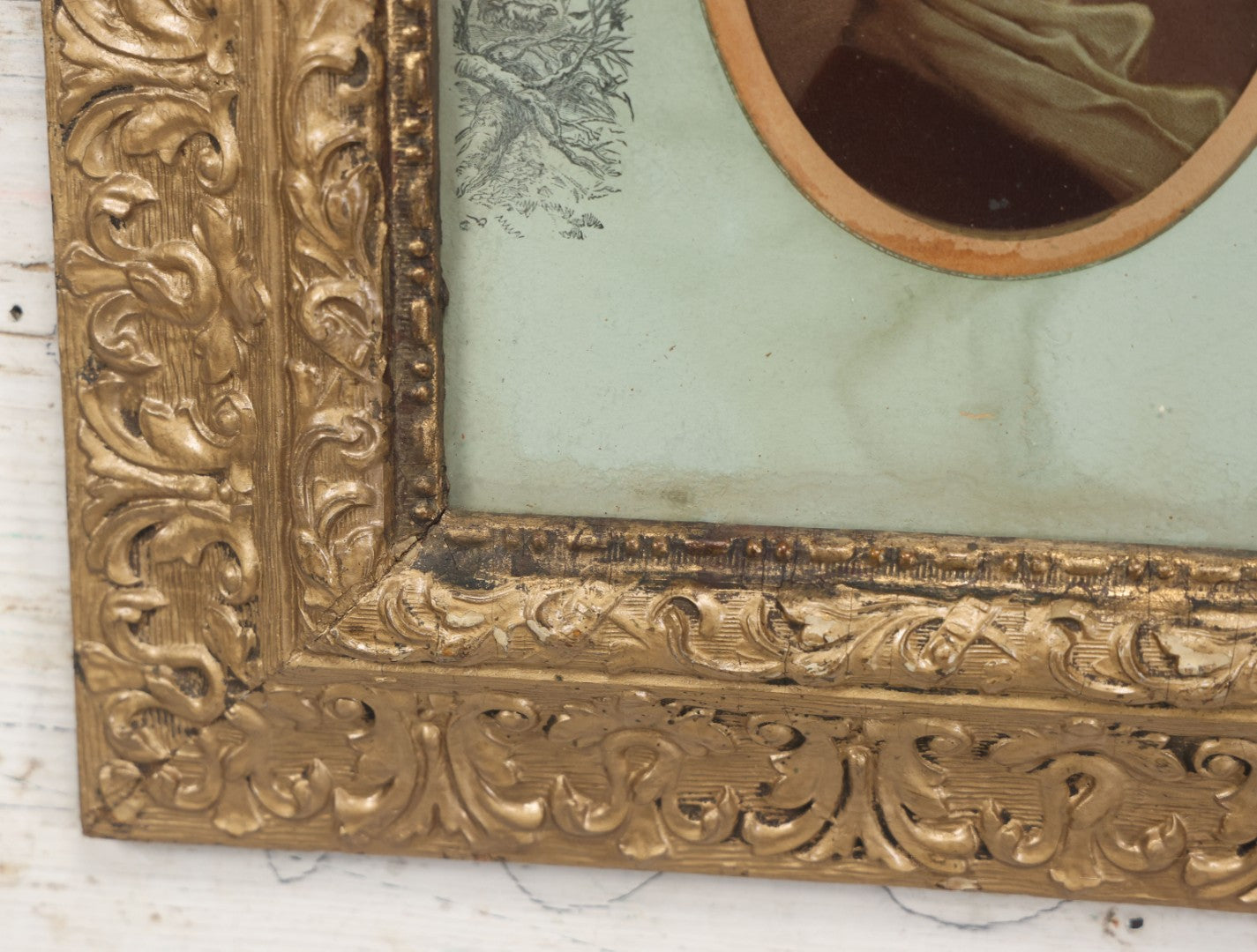 Lot 038 - Antique Chromolithograph Portrait Print Of A Victorian Woman In Headscarf, In Ornate Wooden Gilded Wooden Frame With Decorative Nature Motif Mat, 13-1/4" x 15-1/4"