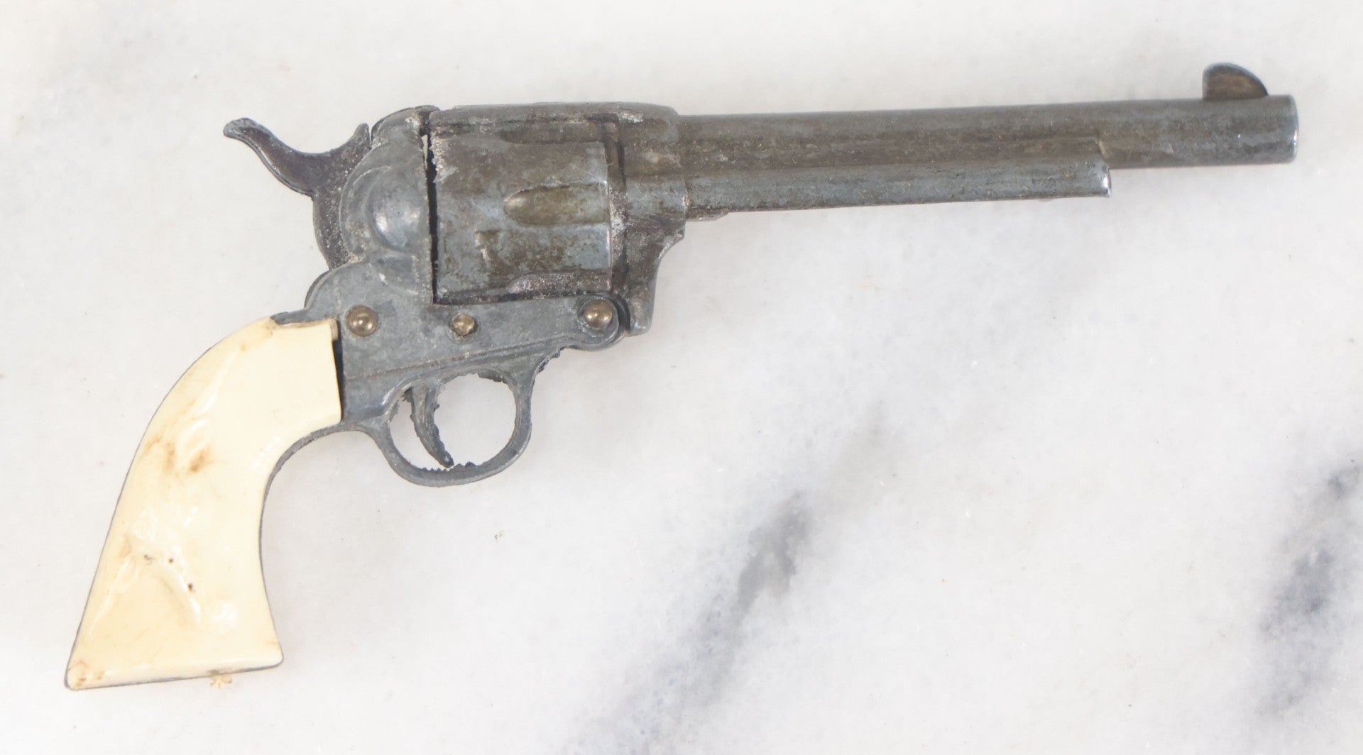 Lot 098 - Vintage Miniature Revolver Pistol Toy Cowboy Gun With Plastic Steer Head Grip