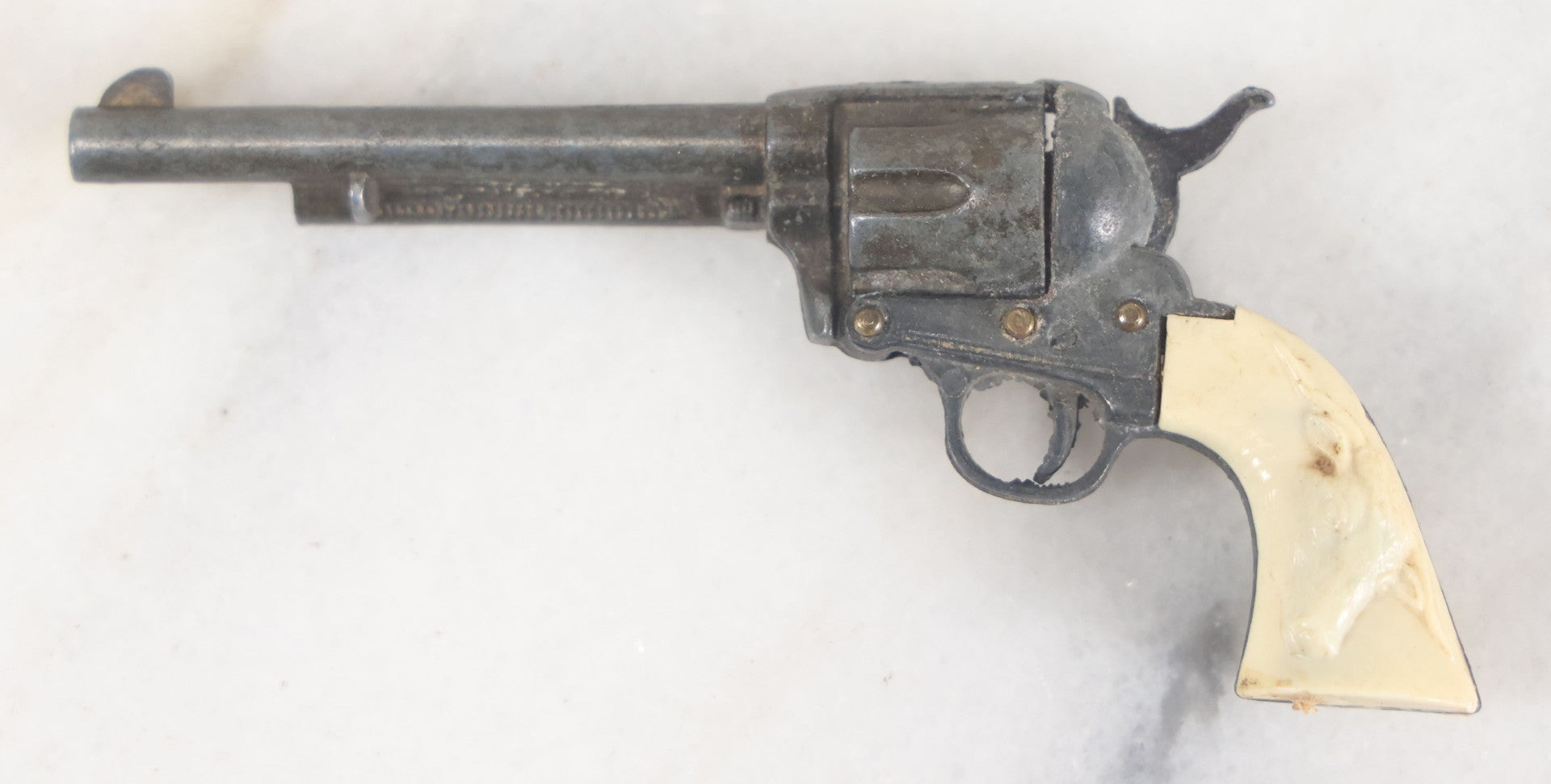 Lot 098 - Vintage Miniature Revolver Pistol Toy Cowboy Gun With Plastic Steer Head Grip