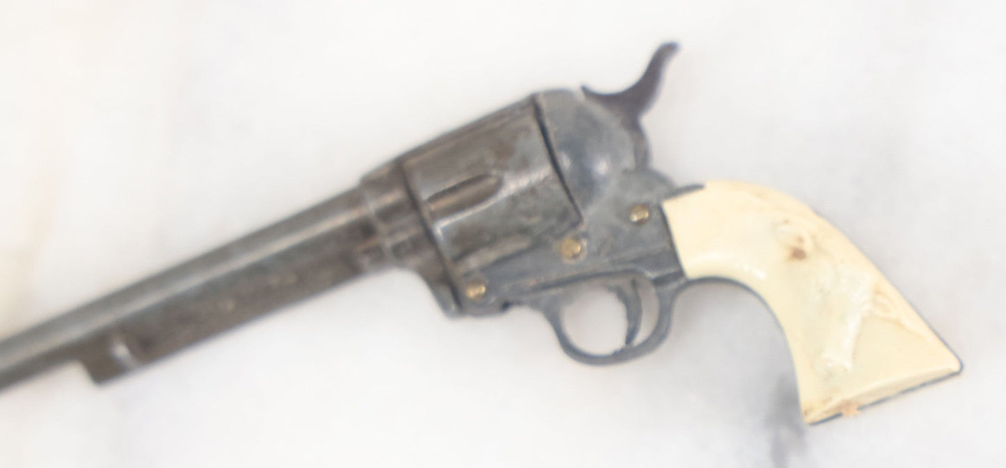 Lot 098 - Vintage Miniature Revolver Pistol Toy Cowboy Gun With Plastic Steer Head Grip