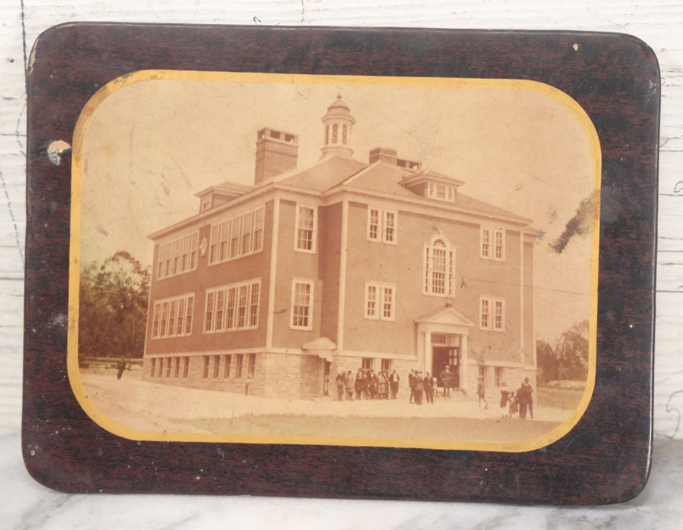 Lot 103 - Antique Rectangular Celluloid Photo Button Of A Brick School, Students Standing Outside, Circa Early 20th Century