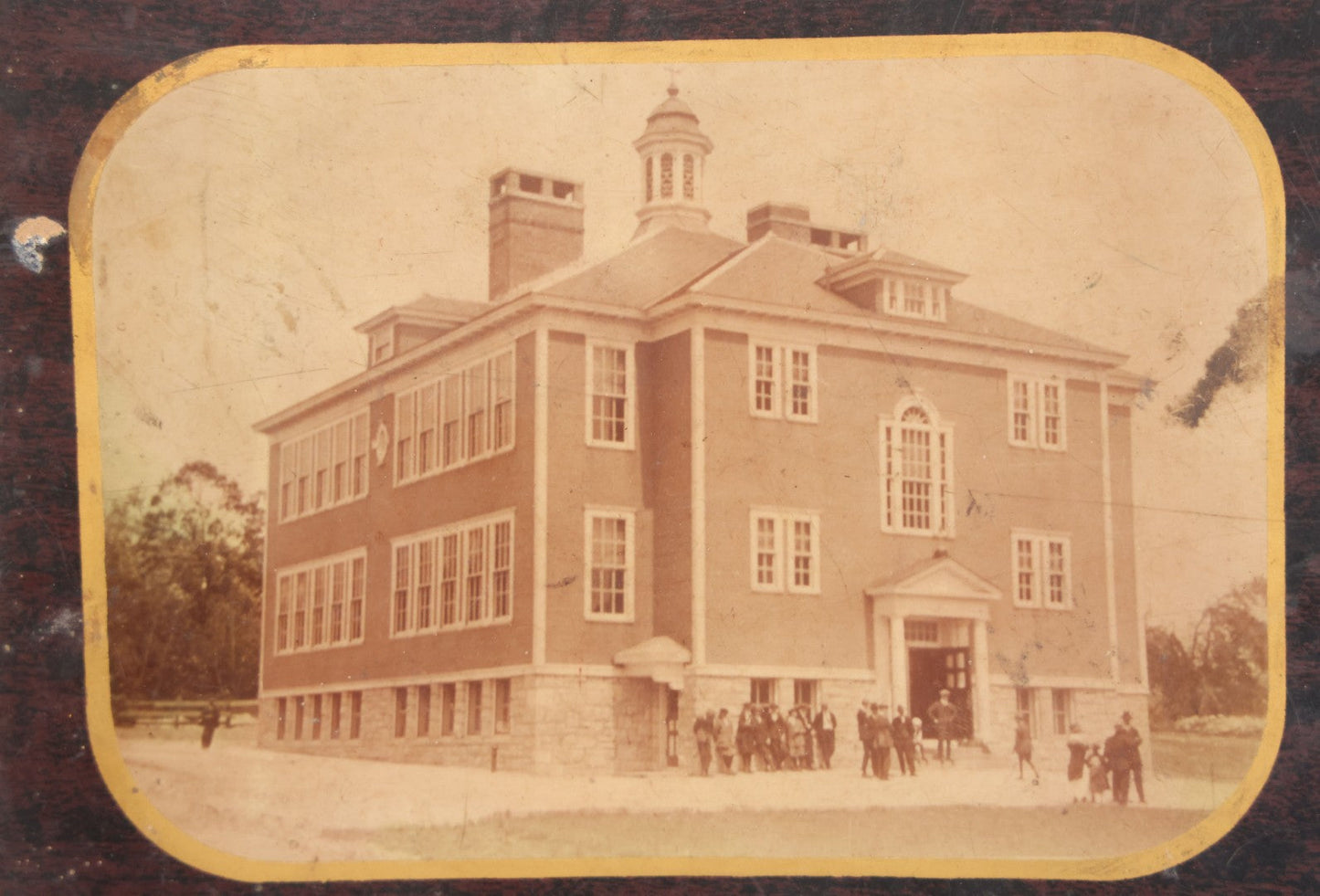 Lot 103 - Antique Rectangular Celluloid Photo Button Of A Brick School, Students Standing Outside, Circa Early 20th Century