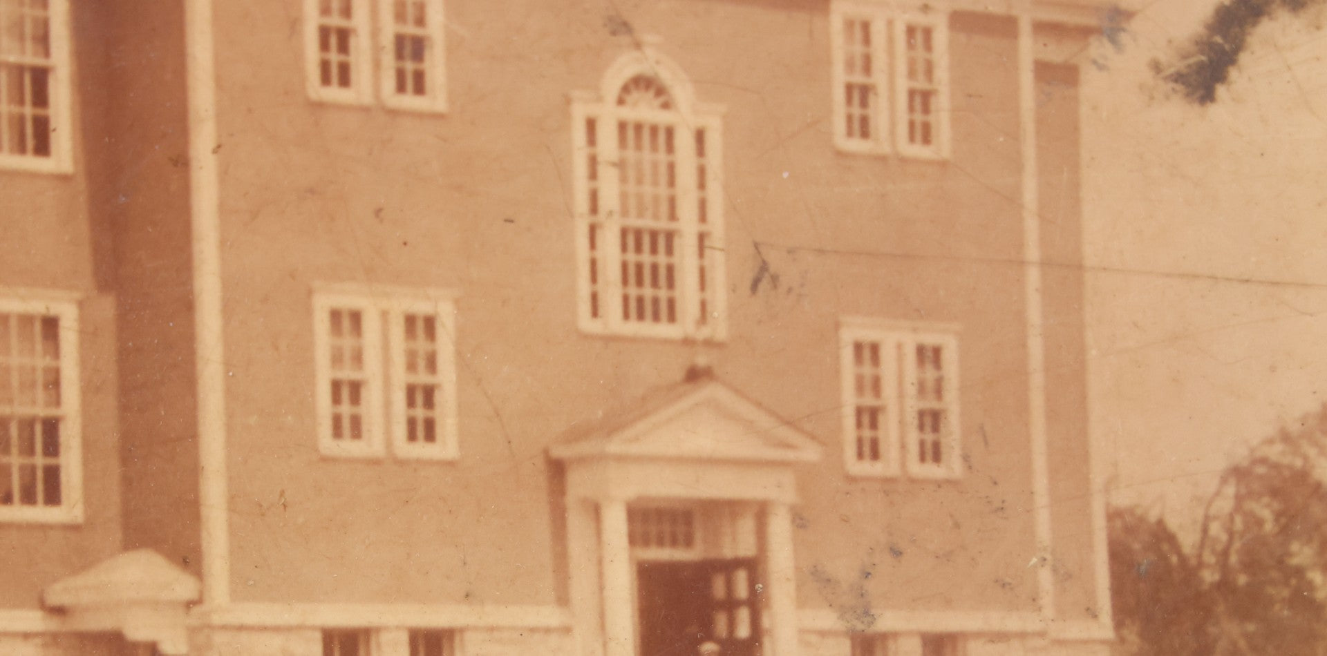 Lot 103 - Antique Rectangular Celluloid Photo Button Of A Brick School, Students Standing Outside, Circa Early 20th Century