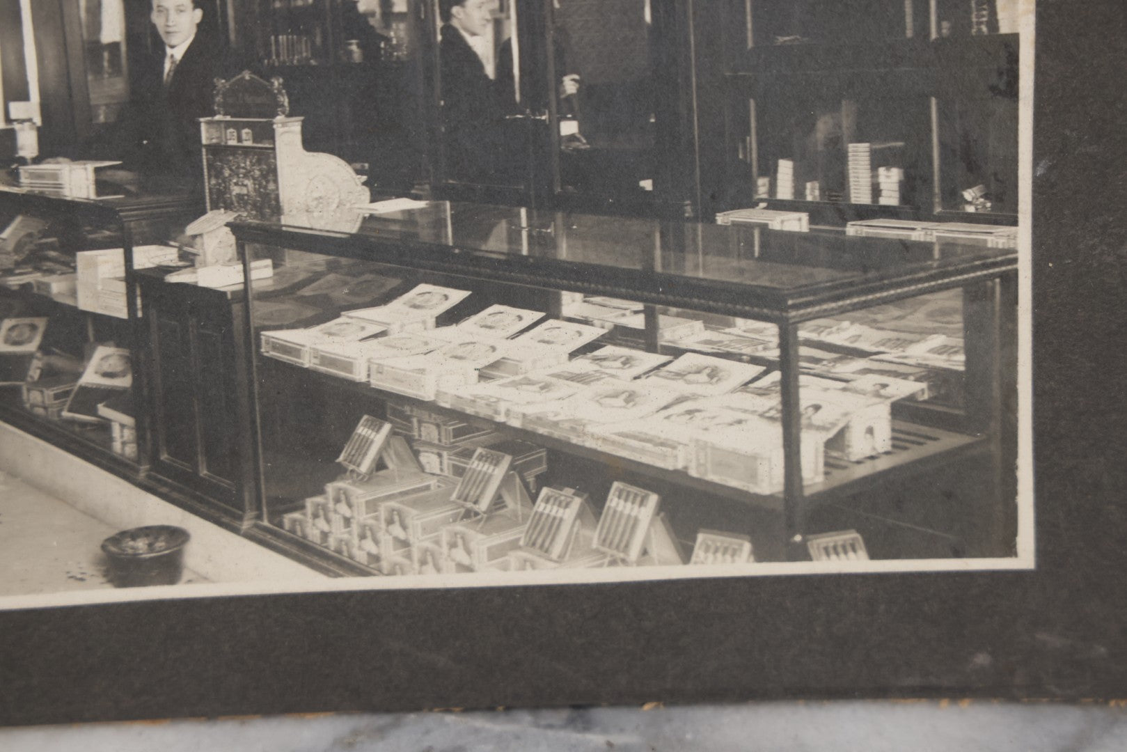 Lot 109 - Antique Boarded Photo Of A Tobacco, Cigar Shop, With Man Behind Counter, Customers In Bowler Hats, Various Cigar Brands