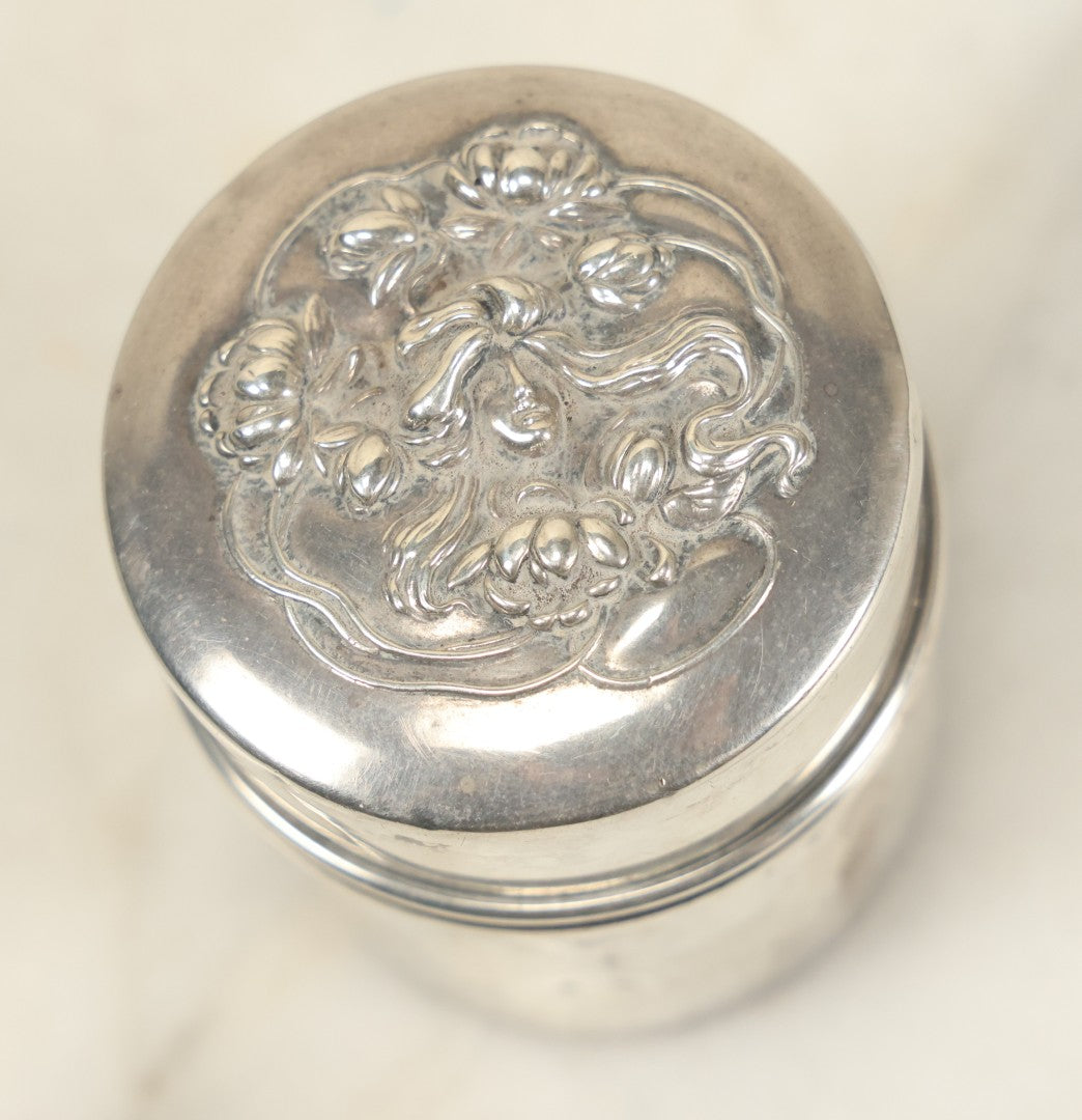 Lot 027 - Antique Art Nouveau Sterling Silver Powder Box With Woman Face Motif, Axe With Three x Hallmark, Attributed To Wm.B. Kerr & Co - Newark, Nj - Approx 1.55 Ounces Troy