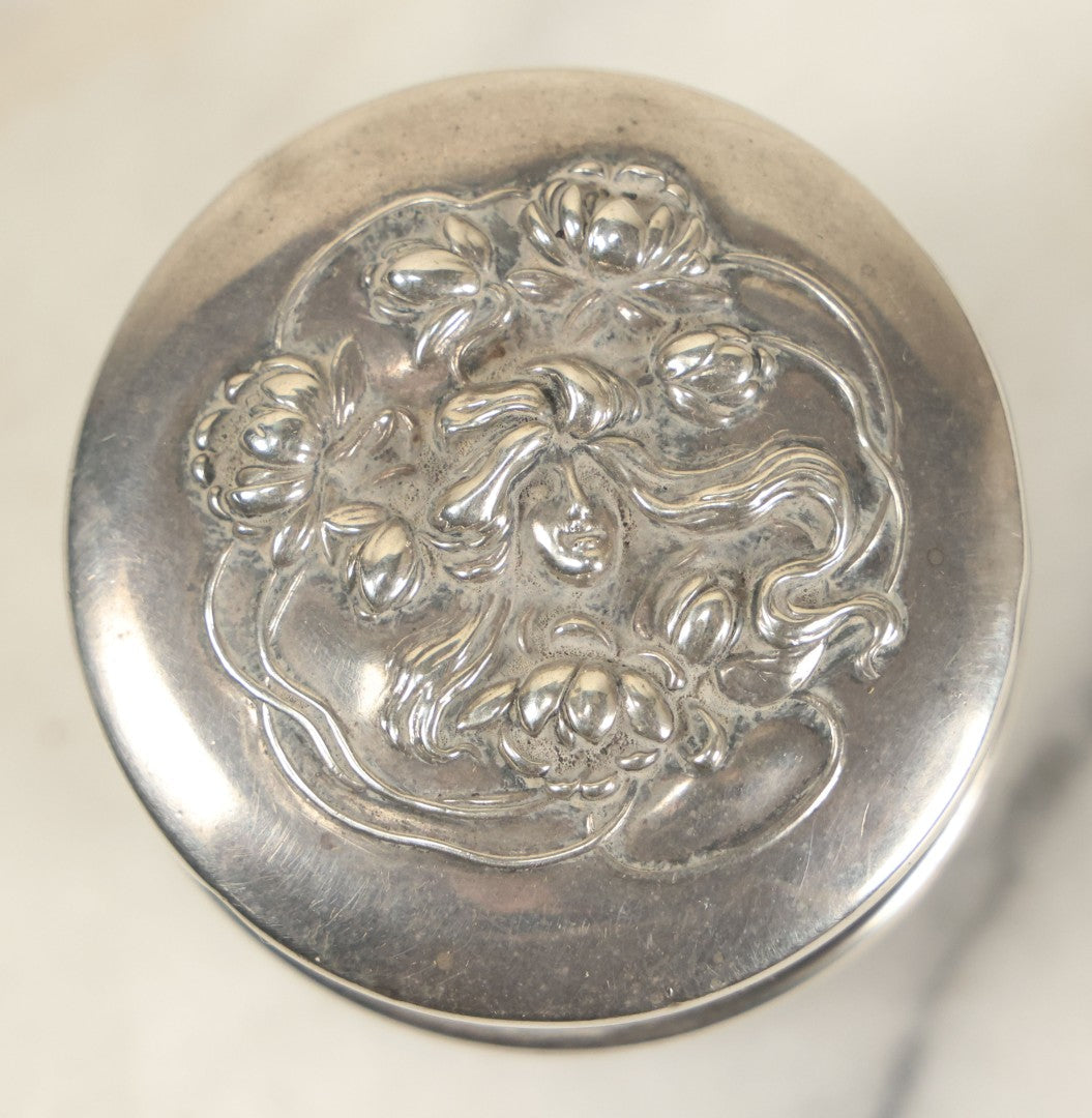 Lot 027 - Antique Art Nouveau Sterling Silver Powder Box With Woman Face Motif, Axe With Three x Hallmark, Attributed To Wm.B. Kerr & Co - Newark, Nj - Approx 1.55 Ounces Troy