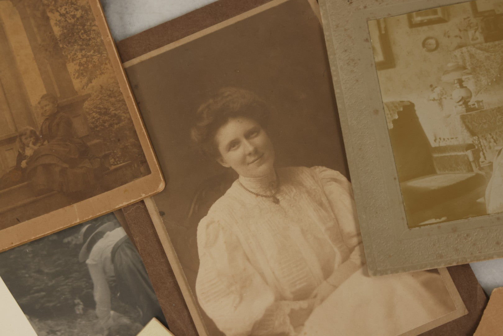 Lot 178 - Grouping Of 10+ Miscellaneous Boarded Antique Photographs And Snapshots, Including Women, Interiors, Photographs Of Homes And More