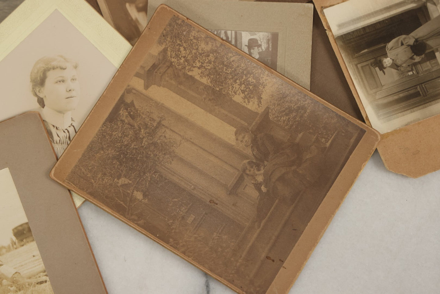 Lot 178 - Grouping Of 10+ Miscellaneous Boarded Antique Photographs And Snapshots, Including Women, Interiors, Photographs Of Homes And More