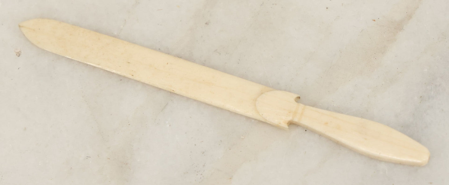 Lot 050 - Antique Carved Scrimshaw Bone Miniature Sword, Primitive Handcrafted Design
