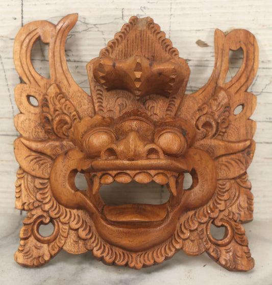Lot 053 - Vintage Hand-Carved Wooden Balinese Barong Mask, Ornate Mythological Decor