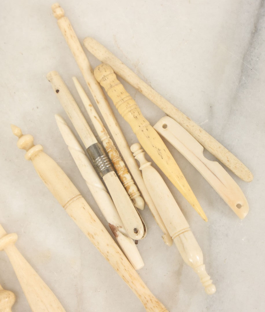 Lot 058 - Grouping Of Antique And Vintage Bone Crochet Hooks, Lace Bobbins, Sewing Tools, Implements, And Fragments, Various Sizes And Styles, Approximately 20 Pieces