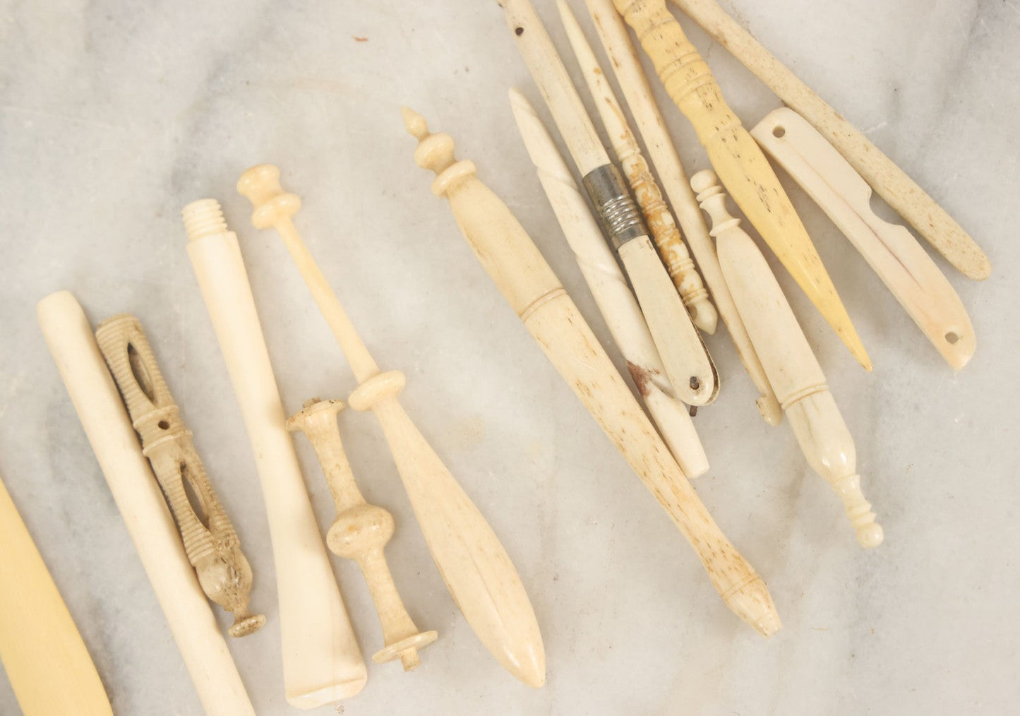 Lot 058 - Grouping Of Antique And Vintage Bone Crochet Hooks, Lace Bobbins, Sewing Tools, Implements, And Fragments, Various Sizes And Styles, Approximately 20 Pieces