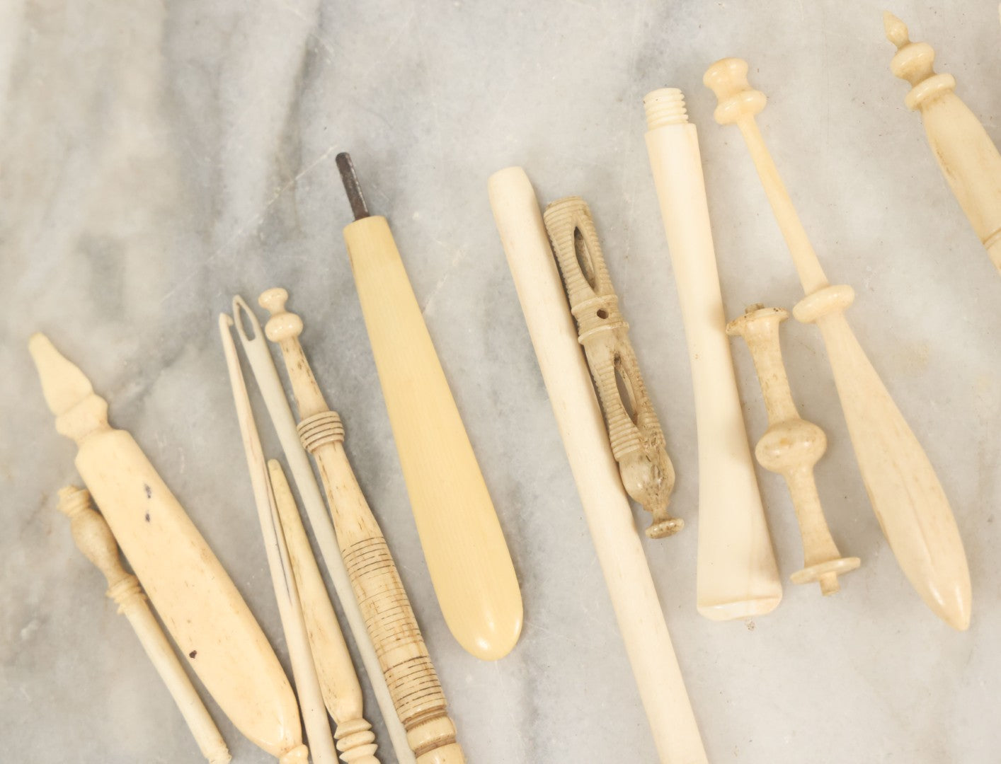 Lot 058 - Grouping Of Antique And Vintage Bone Crochet Hooks, Lace Bobbins, Sewing Tools, Implements, And Fragments, Various Sizes And Styles, Approximately 20 Pieces