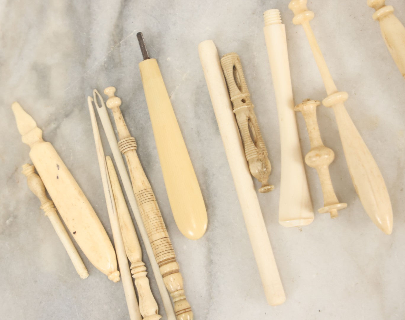 Lot 058 - Grouping Of Antique And Vintage Bone Crochet Hooks, Lace Bobbins, Sewing Tools, Implements, And Fragments, Various Sizes And Styles, Approximately 20 Pieces