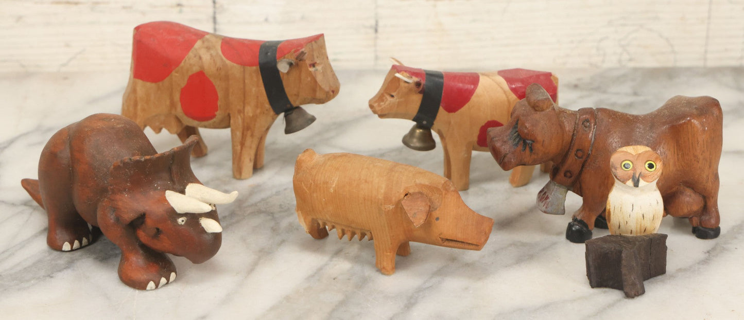Lot 062 - Grouping Of Vintage Hand-Carved Wooden Animal Figures, Cows, Pig, Dinosaur, Owl, And Folk Art Pieces