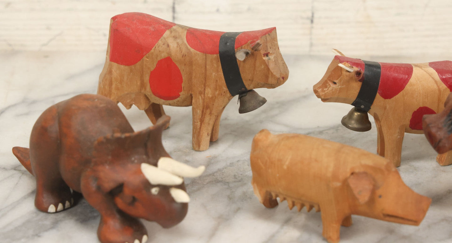 Lot 062 - Grouping Of Vintage Hand-Carved Wooden Animal Figures, Cows, Pig, Dinosaur, Owl, And Folk Art Pieces