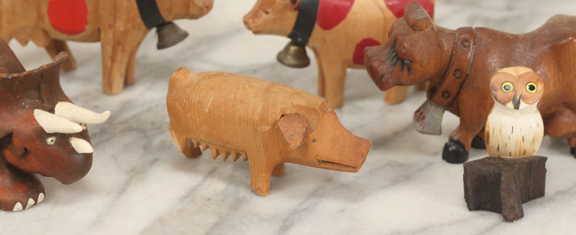 Lot 062 - Grouping Of Vintage Hand-Carved Wooden Animal Figures, Cows, Pig, Dinosaur, Owl, And Folk Art Pieces