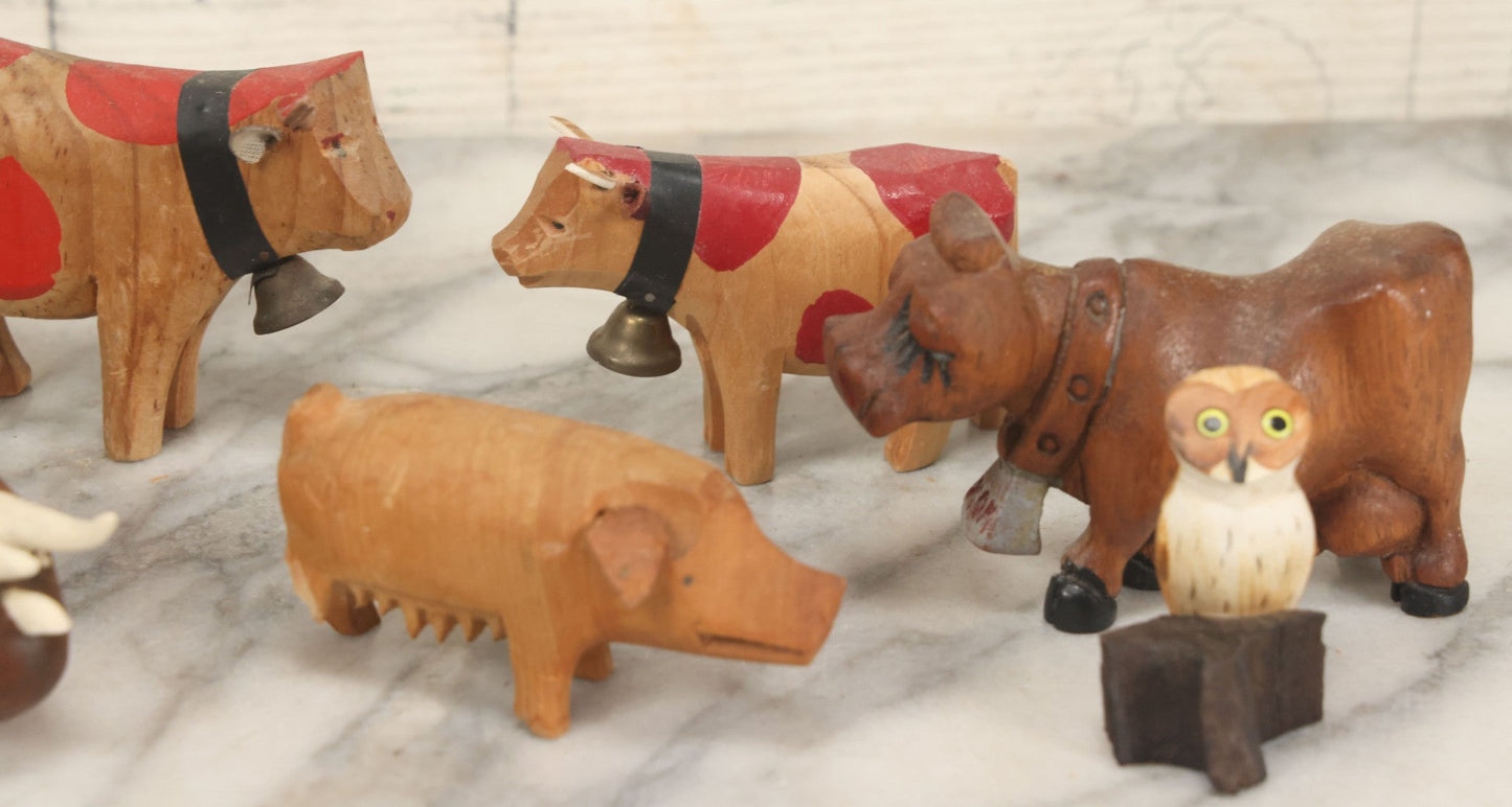 Lot 062 - Grouping Of Vintage Hand-Carved Wooden Animal Figures, Cows, Pig, Dinosaur, Owl, And Folk Art Pieces