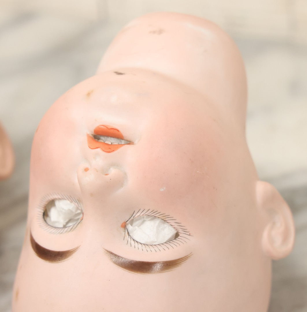 Lot 064 - Pair Of Antique Porcelain Doll Heads With Glass Eyes, Note Cracks, Missing Parts, And Age Wear, Armand Marseille 1894 & Limbach Wally