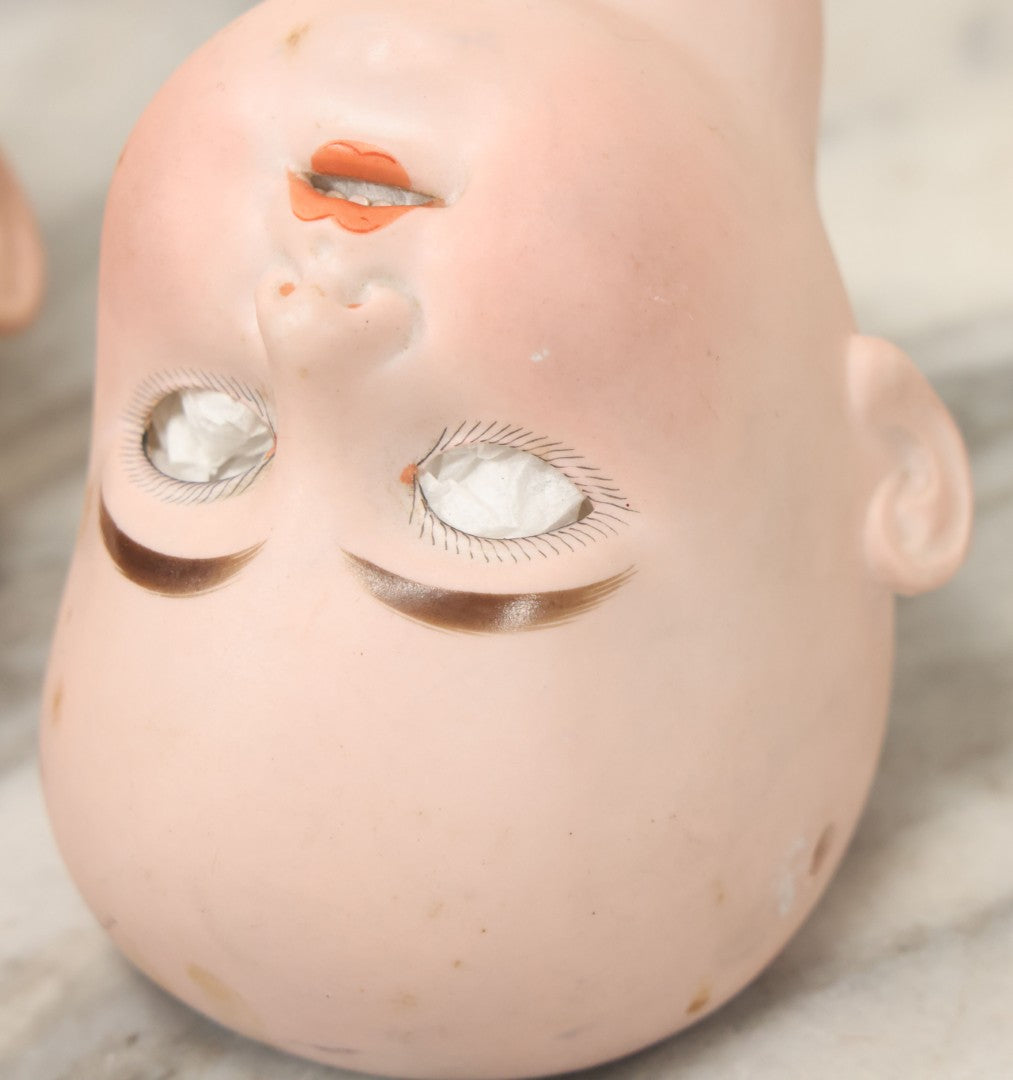 Lot 064 - Pair Of Antique Porcelain Doll Heads With Glass Eyes, Note Cracks, Missing Parts, And Age Wear, Armand Marseille 1894 & Limbach Wally