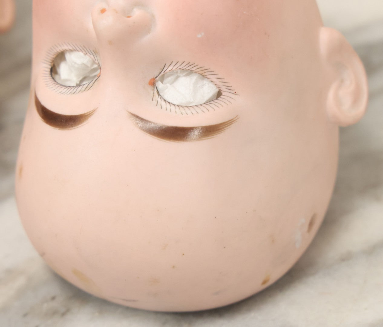 Lot 064 - Pair Of Antique Porcelain Doll Heads With Glass Eyes, Note Cracks, Missing Parts, And Age Wear, Armand Marseille 1894 & Limbach Wally