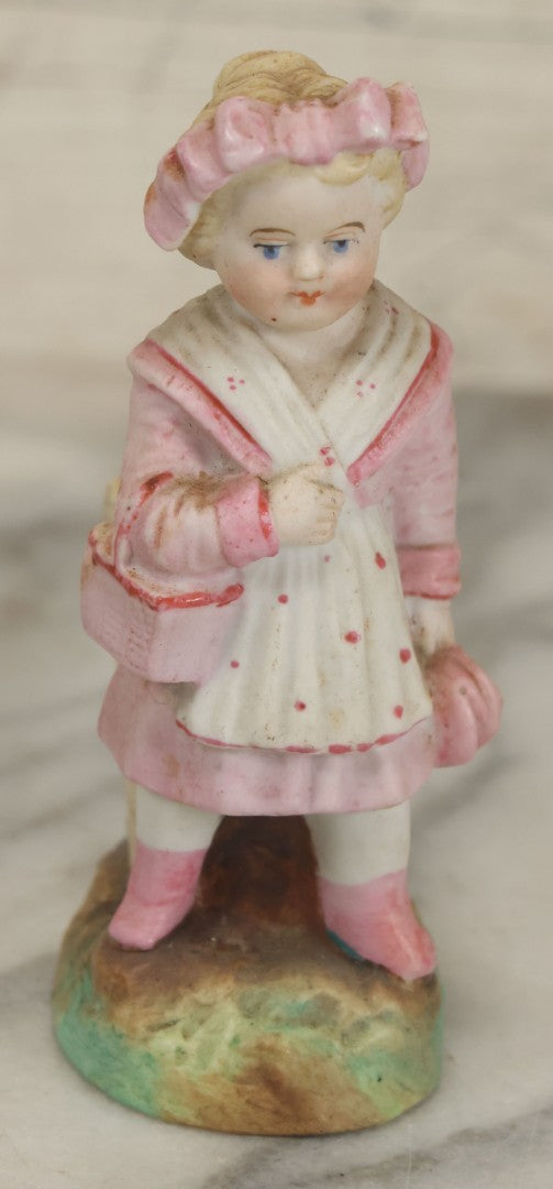 Lot 065 - Antique Hand-Painted Bisque Girl Figural Match Strike, Match Safe, Pink Dress And Bonnet, Likely German