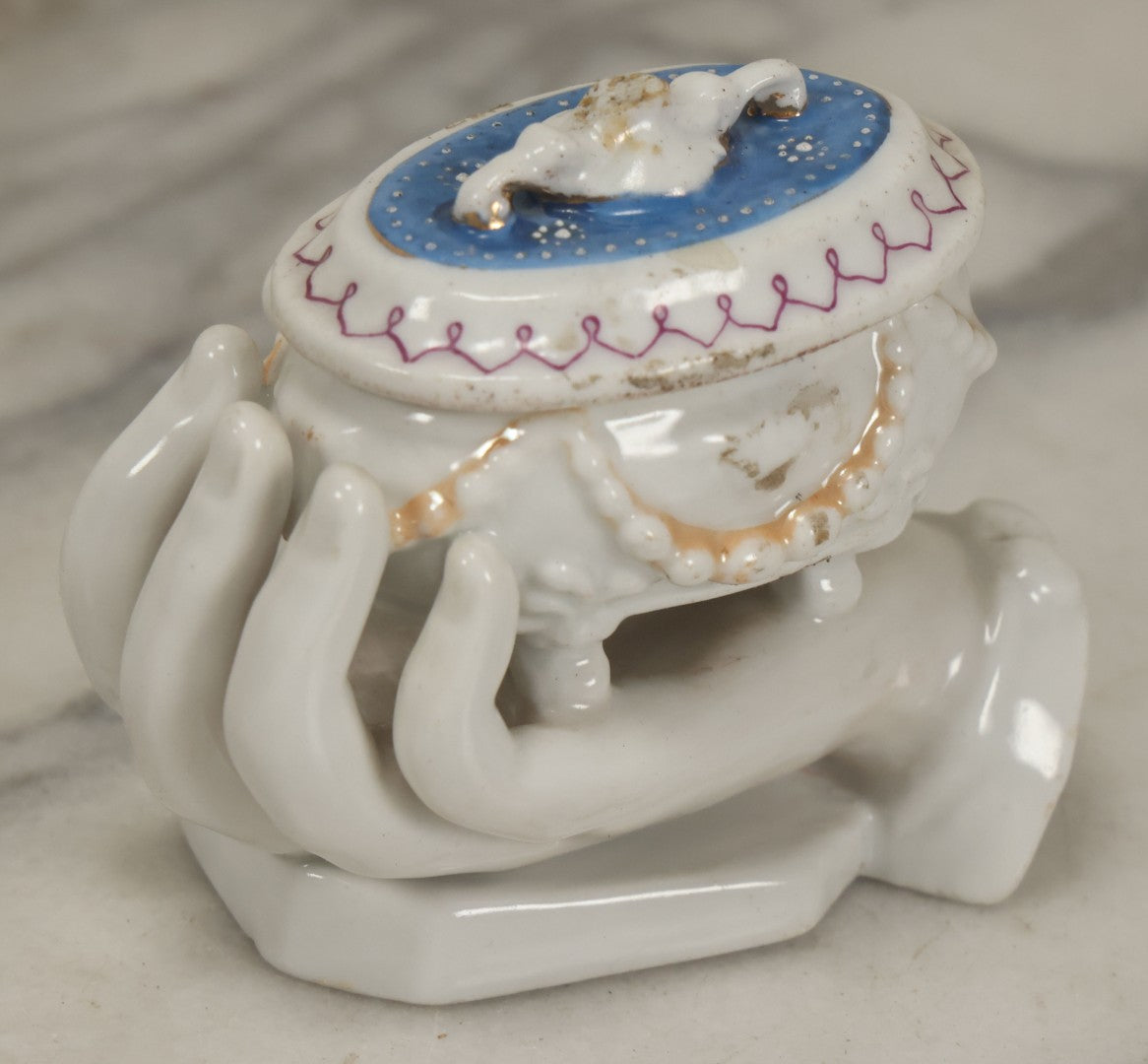Lot 066 - Antique Porcelain Hand Holding Lidded Trinket Box, Ornate Decorative Design, Note Finial Broken Off, Included