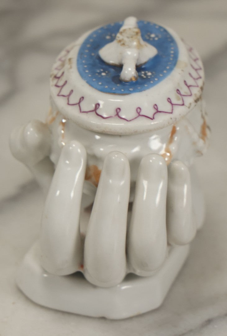 Lot 066 - Antique Porcelain Hand Holding Lidded Trinket Box, Ornate Decorative Design, Note Finial Broken Off, Included