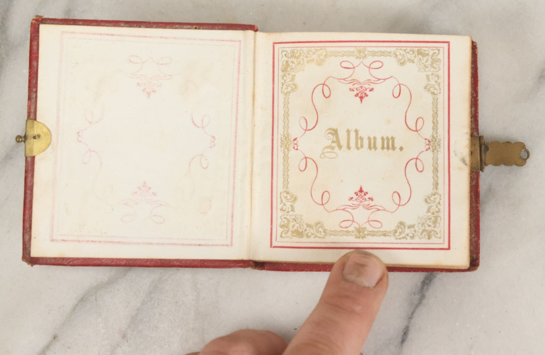 Lot 079 - Antique Red Gem Tintype Photograph Album Containing 70+ Photos, Including Three Dapper Young Men Smoking, Many Identified (All Pages Pictured)