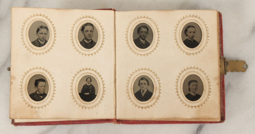 Lot 079 - Antique Red Gem Tintype Photograph Album Containing 70+ Photos, Including Three Dapper Young Men Smoking, Many Identified (All Pages Pictured)