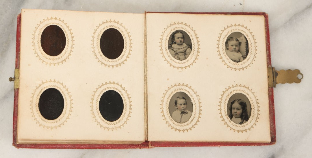 Lot 079 - Antique Red Gem Tintype Photograph Album Containing 70+ Photos, Including Three Dapper Young Men Smoking, Many Identified (All Pages Pictured)