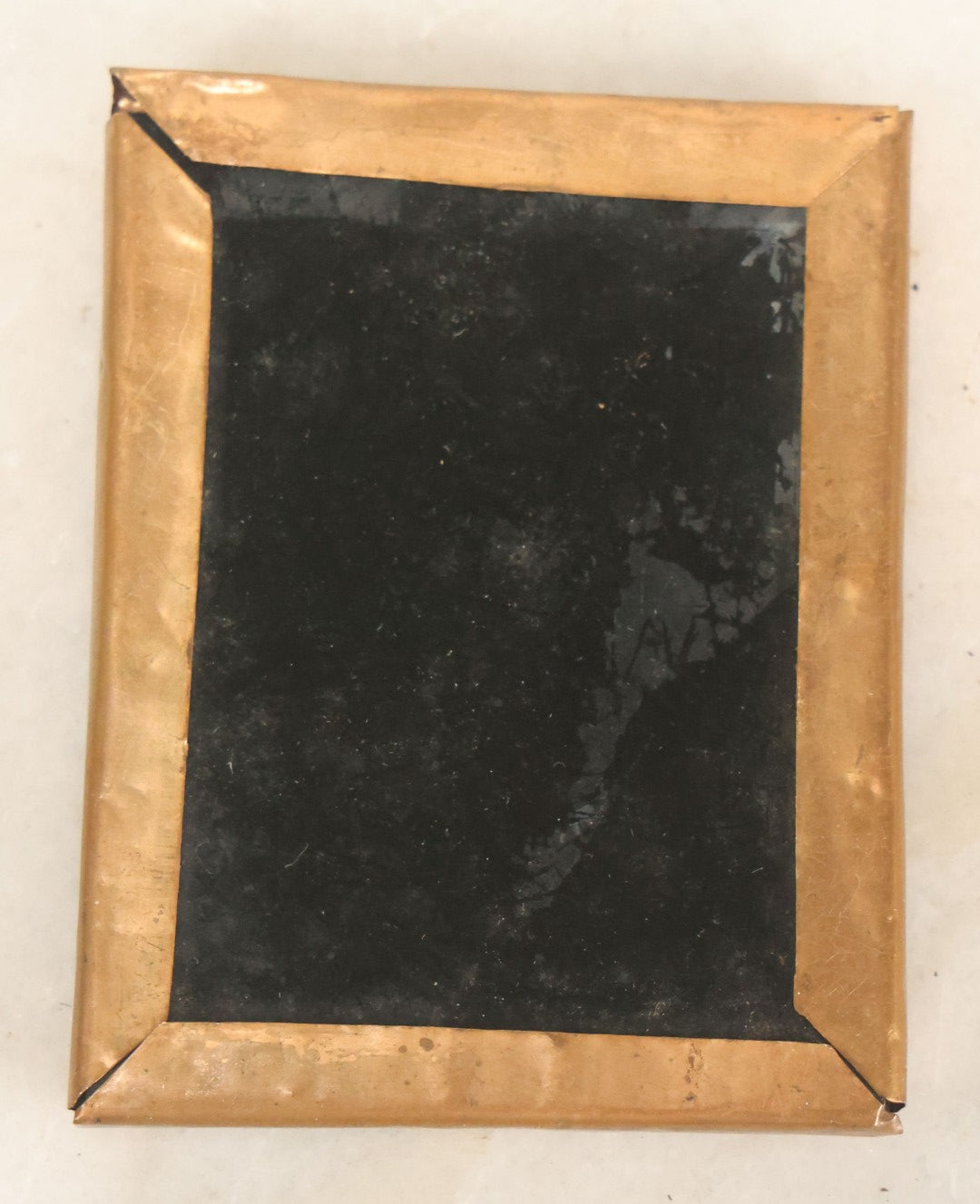 Lot 084 - Antique 1/9th Plate Ruby Ambrotype Photograph Of A Little Boy In A One Piece Suit, Leaning On Table