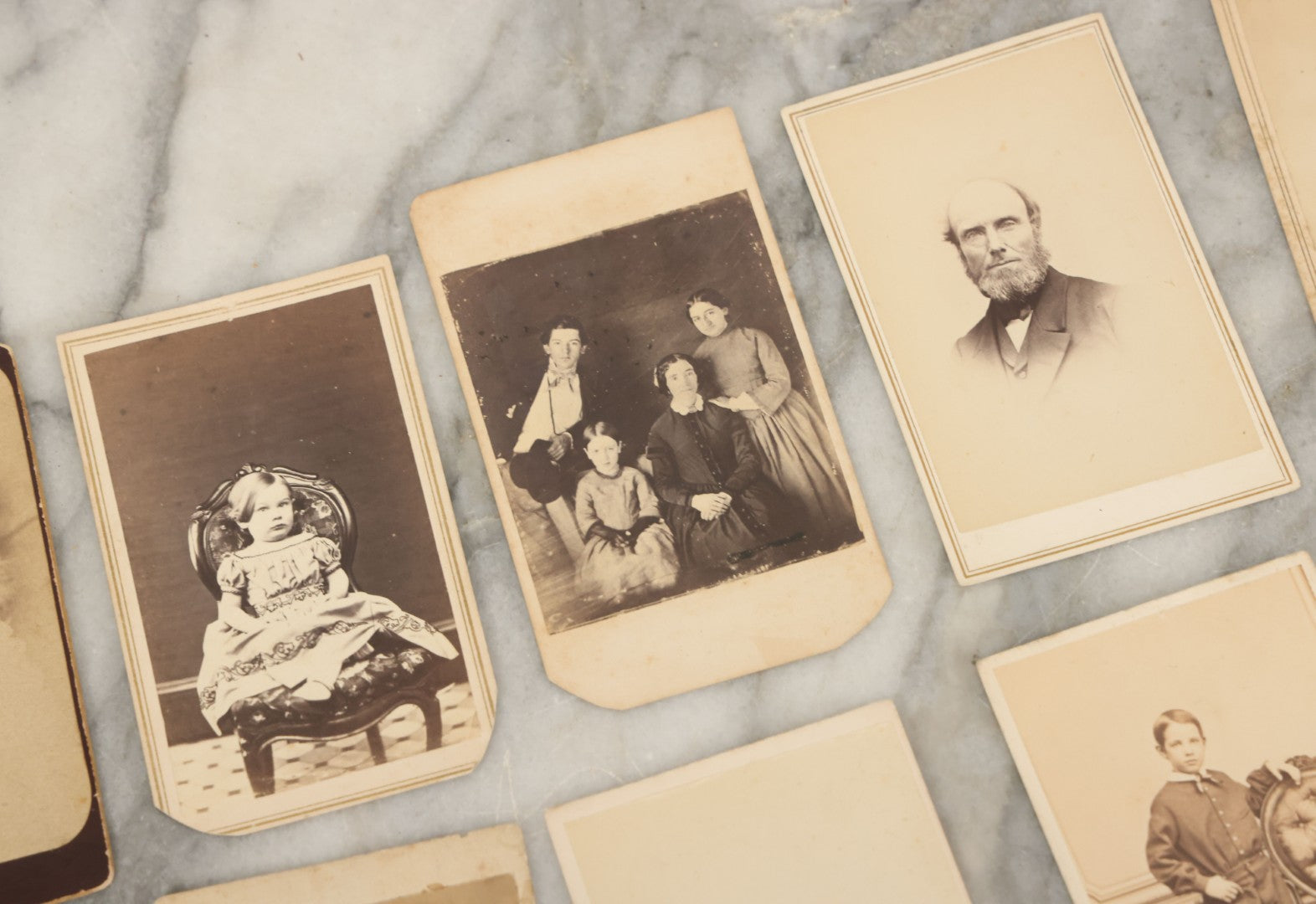 Lot 093 - Grouping Of 22 Assorted Carte De Visite C.D.V. Photographs Of Men, Women, And Children, Including Woman Holding Book, Group Of Four Youths, Etc