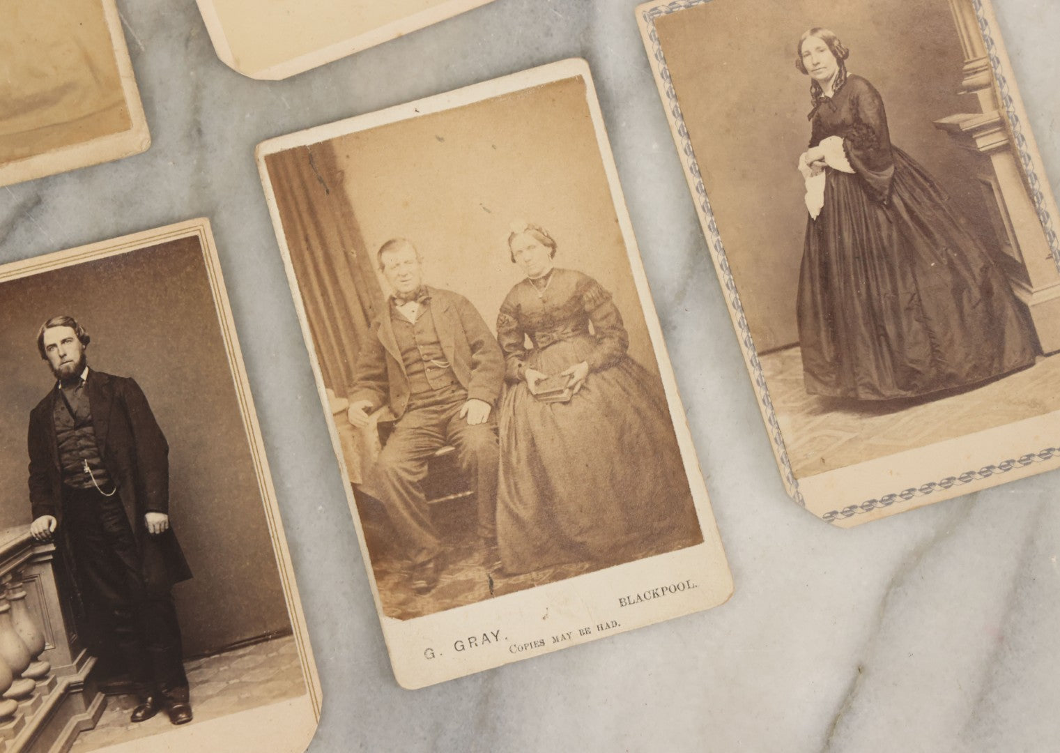 Lot 093 - Grouping Of 22 Assorted Carte De Visite C.D.V. Photographs Of Men, Women, And Children, Including Woman Holding Book, Group Of Four Youths, Etc