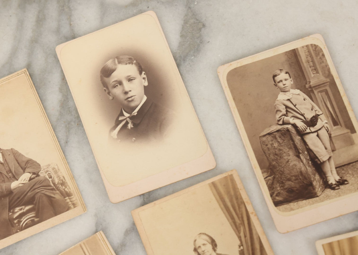 Lot 093 - Grouping Of 22 Assorted Carte De Visite C.D.V. Photographs Of Men, Women, And Children, Including Woman Holding Book, Group Of Four Youths, Etc