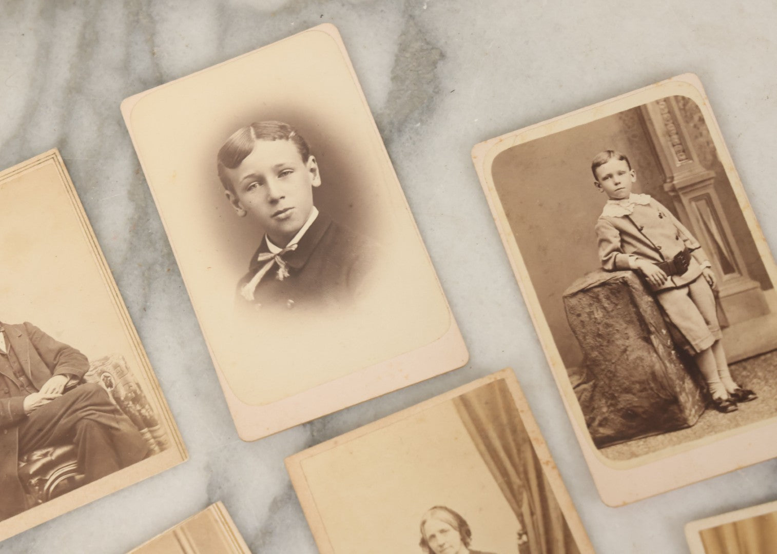 Lot 093 - Grouping Of 22 Assorted Carte De Visite C.D.V. Photographs Of Men, Women, And Children, Including Woman Holding Book, Group Of Four Youths, Etc