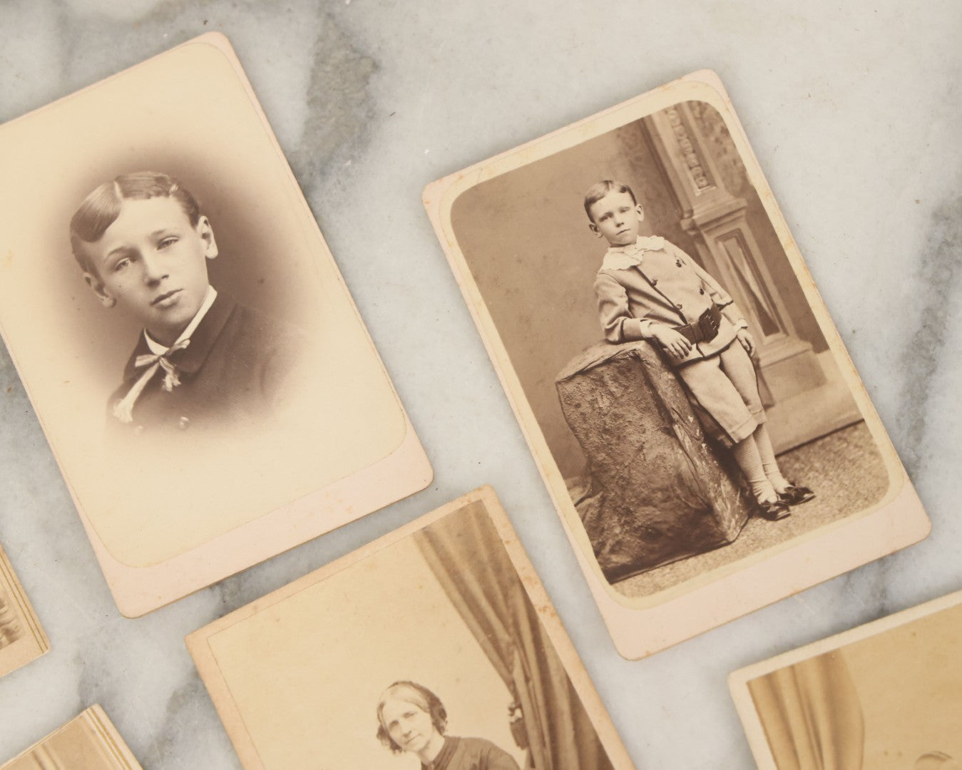 Lot 093 - Grouping Of 22 Assorted Carte De Visite C.D.V. Photographs Of Men, Women, And Children, Including Woman Holding Book, Group Of Four Youths, Etc