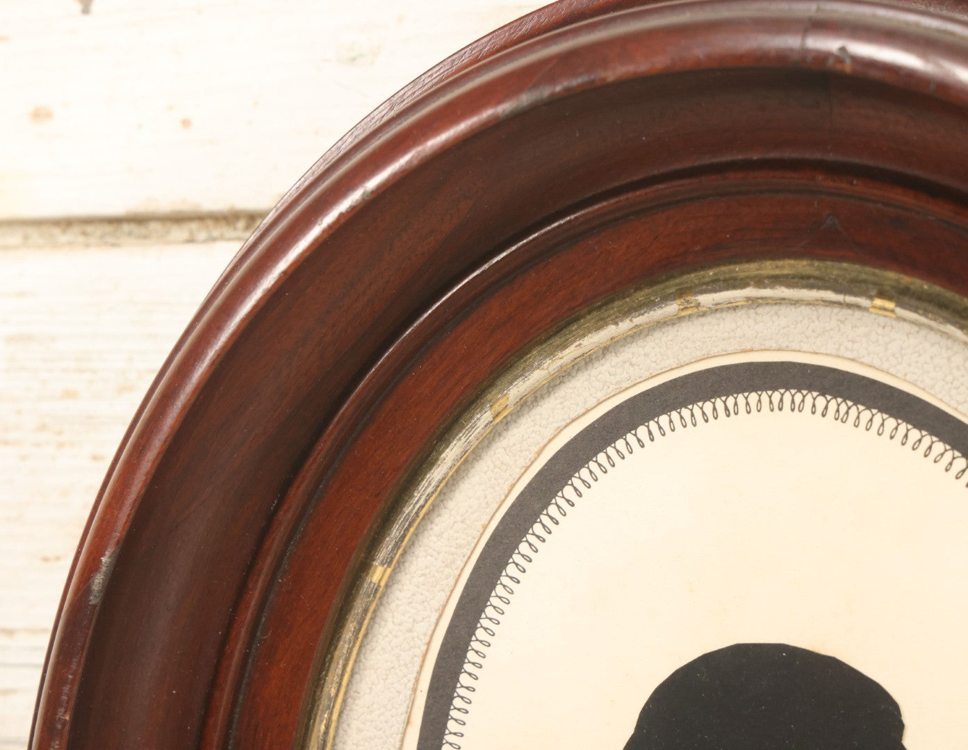 Lot 095 - Antique Hand Cut Paper Silhouette Of A Young Girl In A Deep Oval Frame, 11-3/8 x 13-3/8"