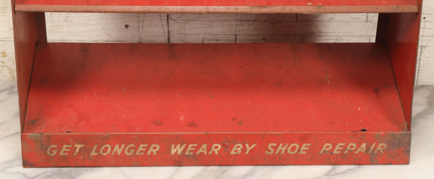 Lot 098 - Vintage Biltrite "Women's Thin Rubber Heels" Metal Shoe Repair Store Display, Red Advertising Shelf, "Get Longer Wear By Shoe Repair," Approximately 16" Wide, 17" Tall