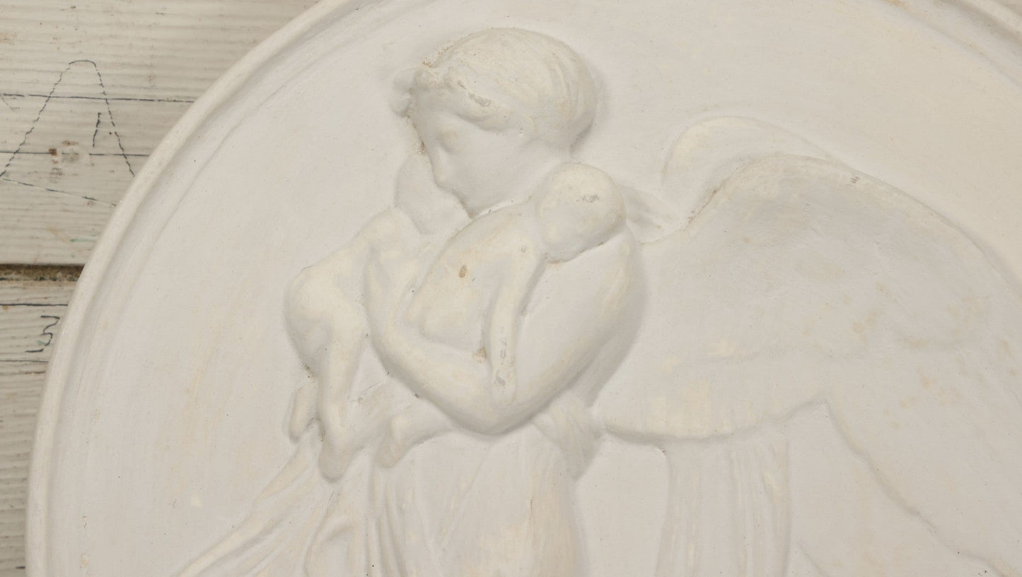 Lot 099 - Vintage White Plaster Relief Plaque, Winged Angel Holding Child, With Owl, 13-3/8" Diameter